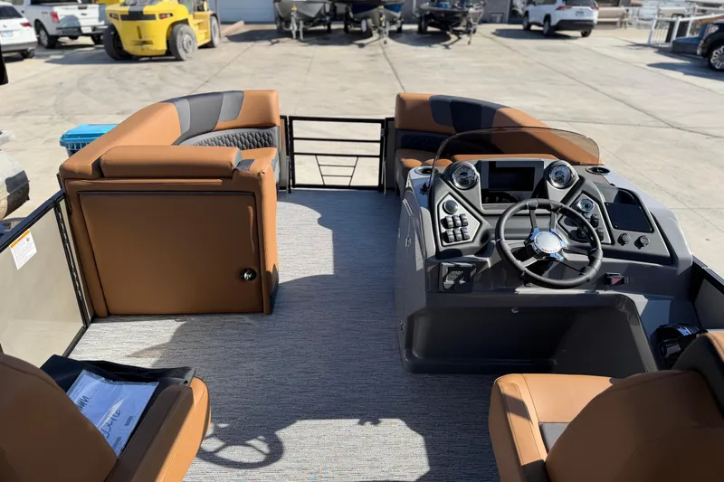 Slide: The Image of Interior of 2026 Sylvan L-1 LZ DH boat with modern dashboard and seating. - 12