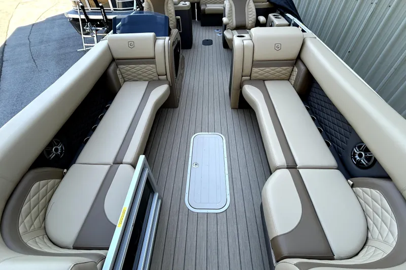 Slide: The Image of Luxurious interior of 2026 Godfrey Monaco 255 ULC pontoon boat with plush seating. - 11