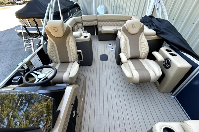 Slide: The Image of Luxurious interior of 2026 Godfrey Monaco 255 ULC pontoon boat with plush seating and modern design. - 13