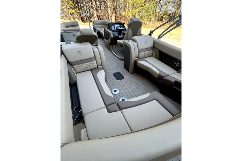 Slide: The Image of Luxurious interior of 2026 Godfrey Monaco 255 ULC pontoon boat with plush seating. - 14