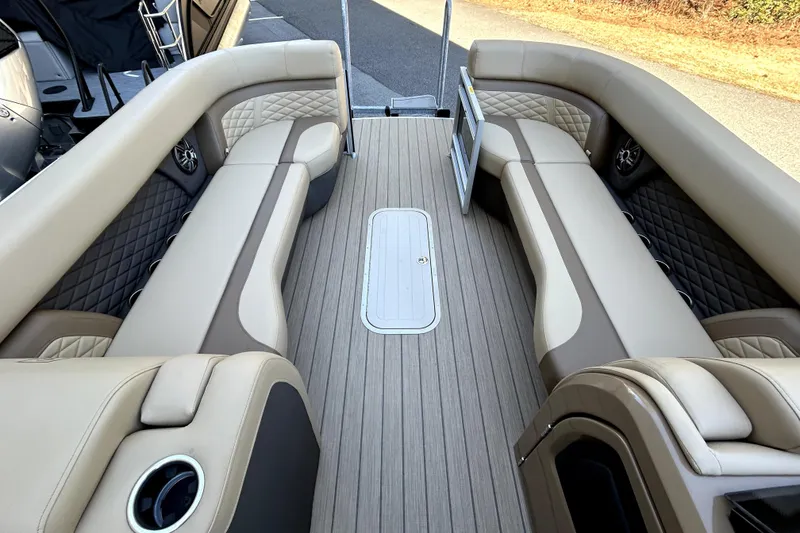 Slide: The Image of Luxurious interior of 2026 Godfrey Monaco 255 ULC pontoon boat with plush seating. - 9