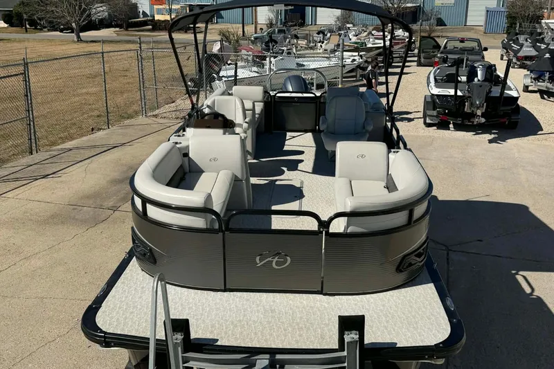 Slide: The Image of 2020 Avalon GS Quad Lounger 23' pontoon boat with spacious seating and sleek design. - 4