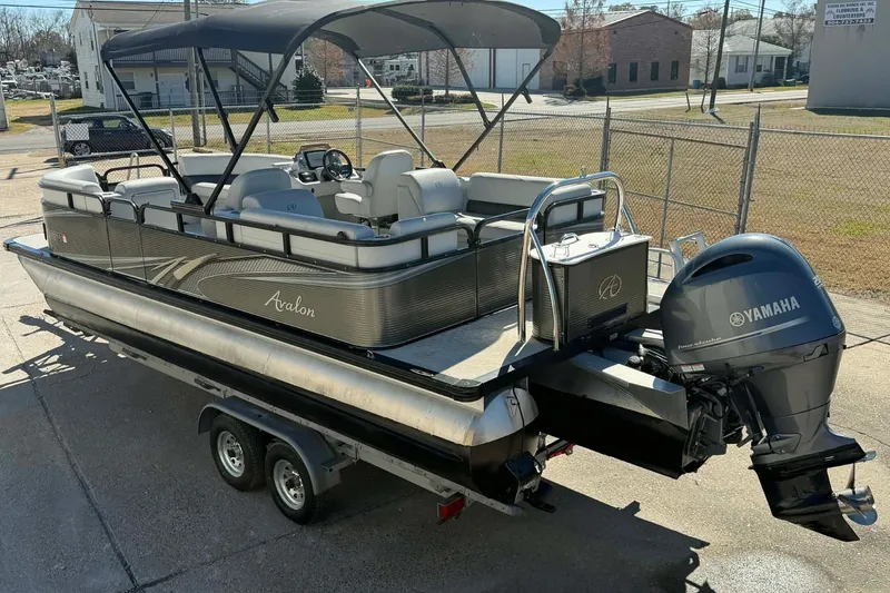 Slide: The Image of 2020 Avalon GS Quad Lounger 23' pontoon boat with Yamaha motor on trailer. - 5