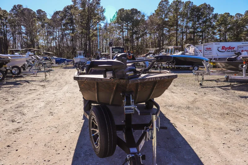 Slide: The Image of 2024 G3 Gator Tough 17 SC boat on trailer in outdoor dealership lot. - 7