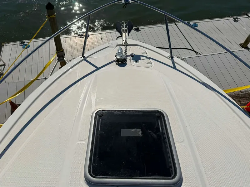 Slide: The Image of Bow of a 2008 Chaparral Signature 250 at the dock. - 11