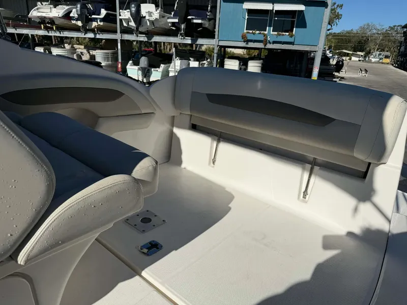 Slide: The Image of Interior of a 2008 Chaparral Signature 250 boat with seating area. - 12