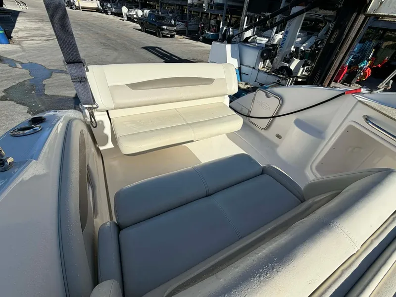 Slide: The Image of Interior of a 2008 Chaparral Signature 250 boat with seating area. - 16