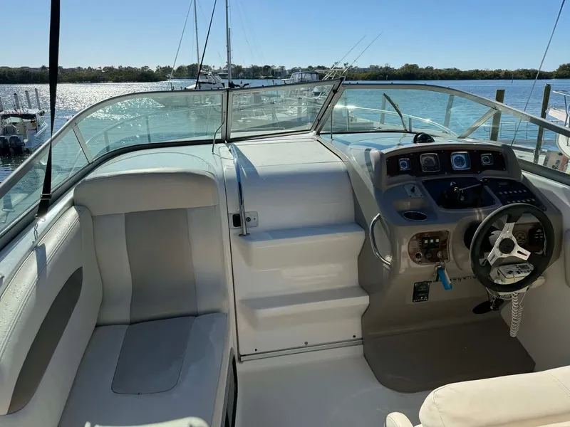 Slide: The Image of Interior of a 2008 Chaparral Signature 250 boat with helm console. - 17