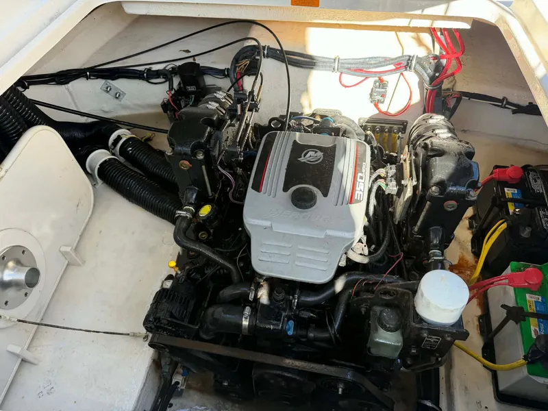 Slide: The Image of Engine compartment of a 2008 Chaparral Signature 250 boat. - 30