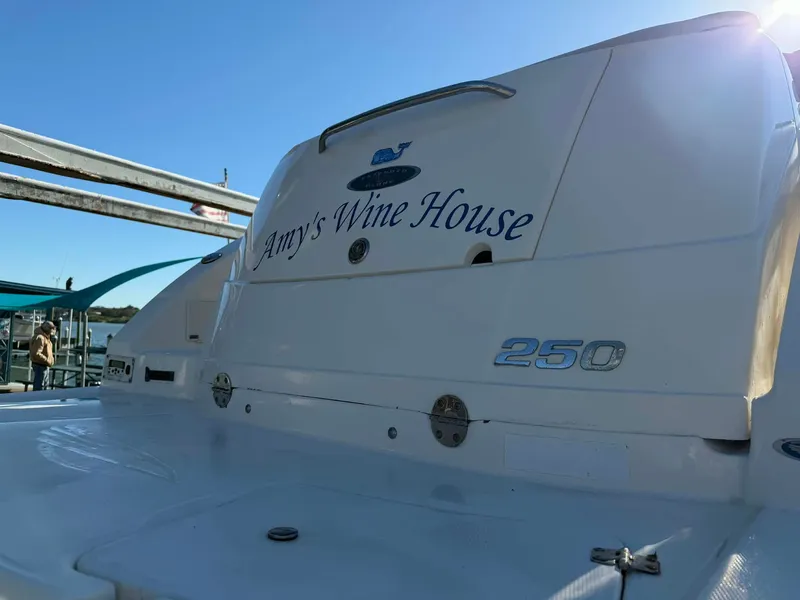 Slide: The Image of Chaparral Signature 250 boat with "Amy's Wine House" lettering. - 33