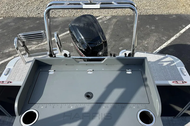 Slide: The Image of 2026 Harris Cruiser 210 boat with sleek design and modern features, rear view. - 13