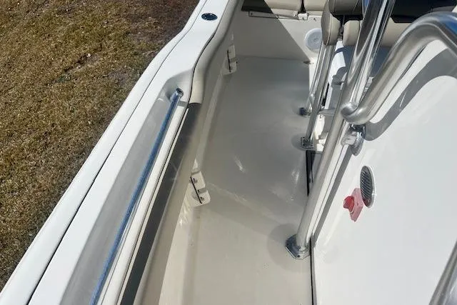 Slide: The Image of 2024 Key West 219 FS boat interior with sleek design and stainless steel fittings. - 10