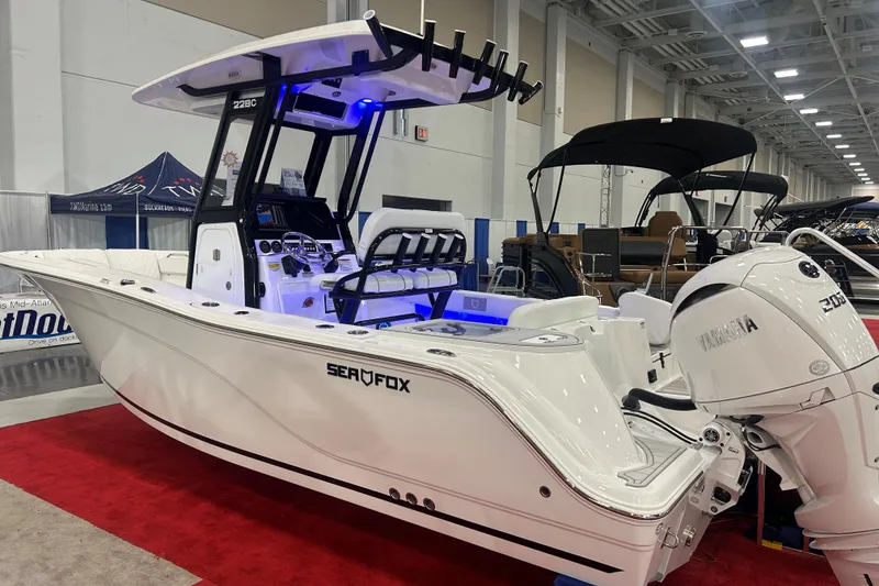 Slide: The Image of 2026 Sea Fox 228 Commander boat displayed indoors with Yamaha engine. - 4