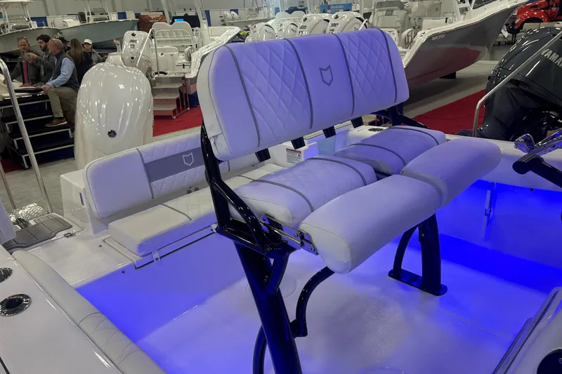 Slide: The Image of 2026 Sea Fox 228 Commander boat interior with illuminated seating and modern design. - 7