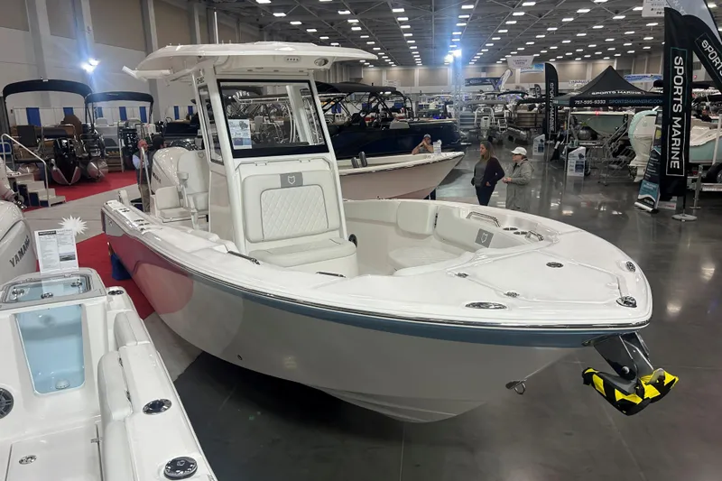 Slide: The Image of 2026 Sea Fox 248 Commander boat displayed at an indoor marine exhibition. - 3