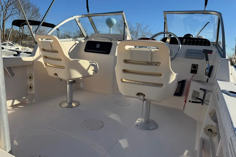 Slide: The Image of 2006 Grady-White Tournament 185 boat interior with dual seats and steering console. - 11