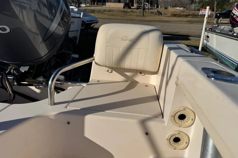 Slide: The Image of 2006 Grady-White Tournament 185 boat interior with seating and motor detail. - 5
