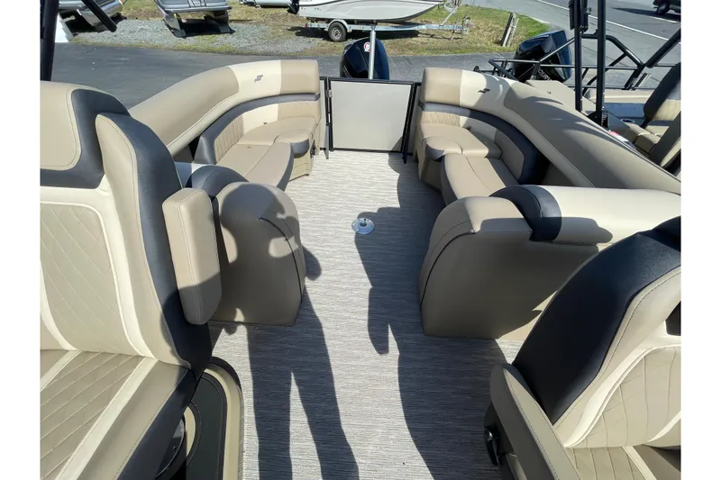 Slide: The Image of Interior of 2026 Starcraft EXS 3 R boat with beige seating and spacious layout. - 6