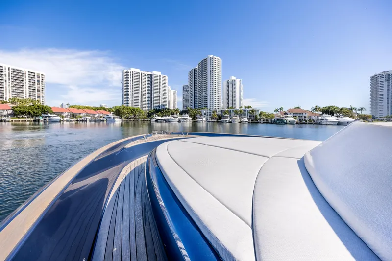 Slide: The Image of 2021 Solaris Power 48 OPEN yacht with city skyline and waterfront view. - 10