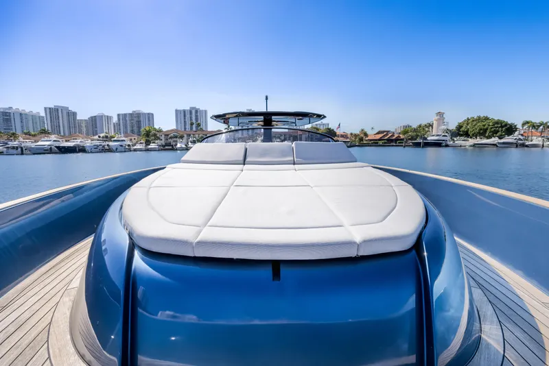 Slide: The Image of 2021 Solaris Power 48 OPEN yacht on calm water, city skyline in background. - 11