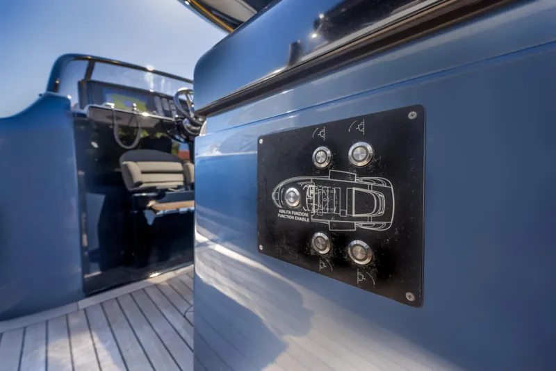 Slide: The Image of 2021 Solaris Power 48 OPEN yacht interior with control panel and seating. - 22