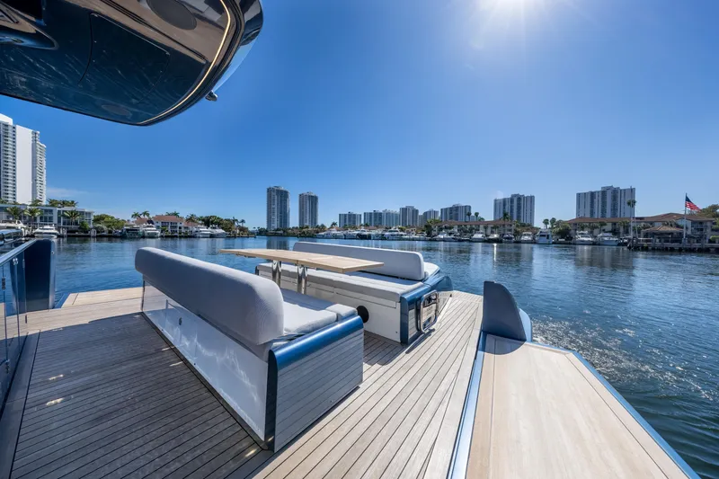 Slide: The Image of Luxurious Solaris Power 48 OPEN yacht deck with waterfront cityscape, 2021 model. - 23
