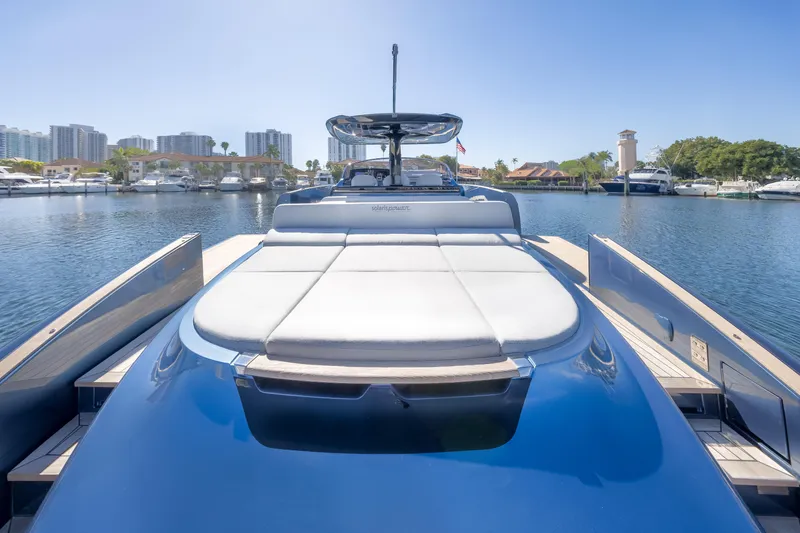 Slide: The Image of 2021 Solaris Power 48 OPEN yacht docked in a marina under clear blue skies. - 28