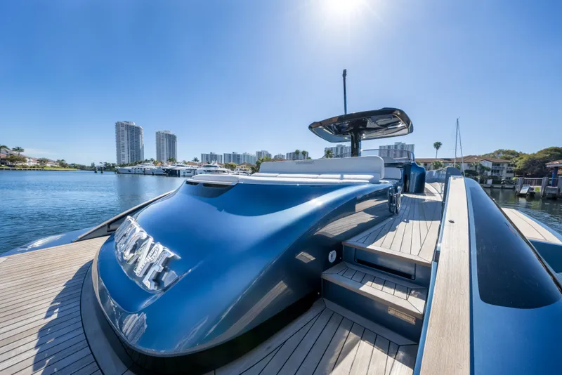 Slide: The Image of Luxurious 2021 Solaris Power 48 OPEN yacht docked under clear blue sky. - 29