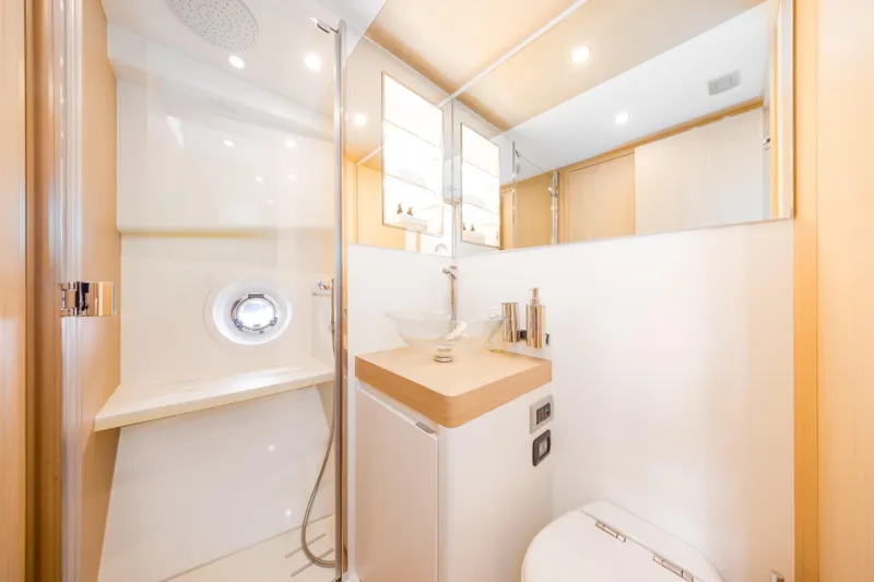 Slide: The Image of Luxurious bathroom interior of 2021 Solaris Power 48 OPEN yacht, featuring modern fixtures and elegant design. - 36