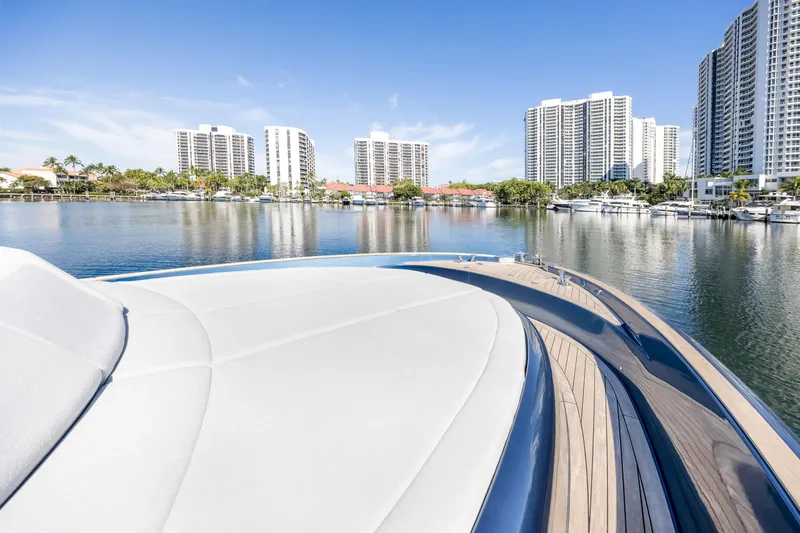 Slide: The Image of 2021 Solaris Power 48 OPEN yacht on water with city skyline backdrop. - 9
