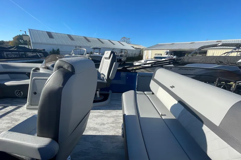 Slide: The Image of 2026 Starcraft SLS 3 RL boat interior with modern seating and sleek design. - 4