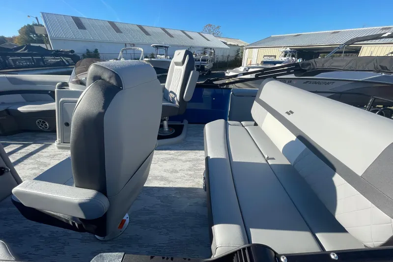 Slide: The Image of 2026 Starcraft SLS 3 RL boat interior with modern seating and sleek design. - 6