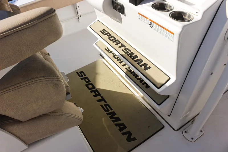 Slide: The Image of 2020 Sportsman Masters 267OE Bay Boat interior with branded mats and seating. - 16