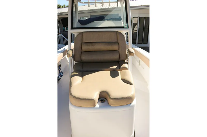 Slide: The Image of 2020 Sportsman Masters 267OE Bay Boat with tan cushioned seating. - 17