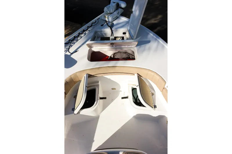Slide: The Image of 2020 Sportsman Masters 267OE Bay Boat deck with open storage compartments. - 20