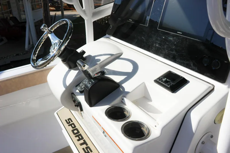 Slide: The Image of 2020 Sportsman Masters 267OE Bay Boat helm with steering wheel and controls. - 23