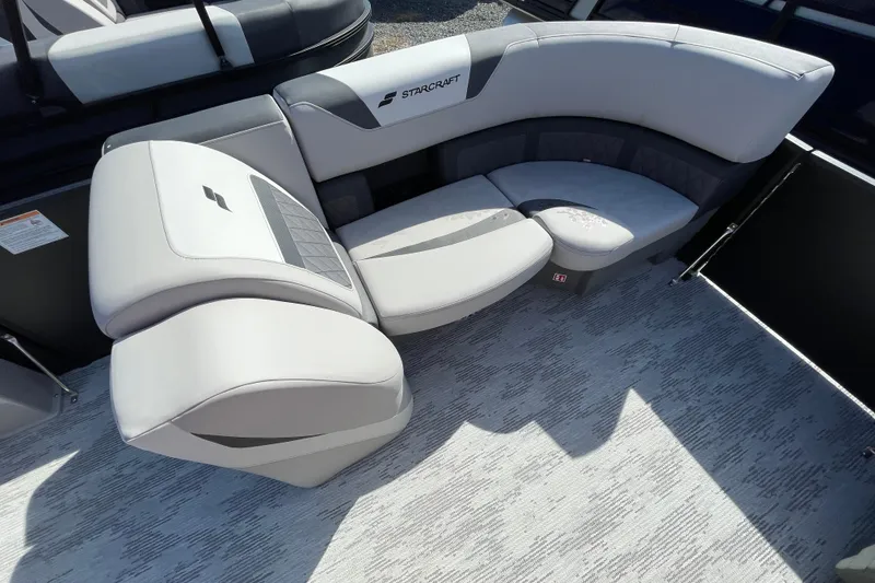 Slide: The Image of 2026 Starcraft SLS 1 boat interior with modern gray seating and stylish design. - 3