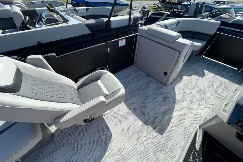 Slide: The Image of 2026 Starcraft SLS 1 boat interior with modern seating and sleek design. - 9