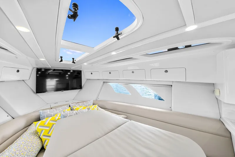 Slide: The Image of Luxurious interior of 2020 Intrepid 407 Cuddy boat with skylight and modern amenities. - 41