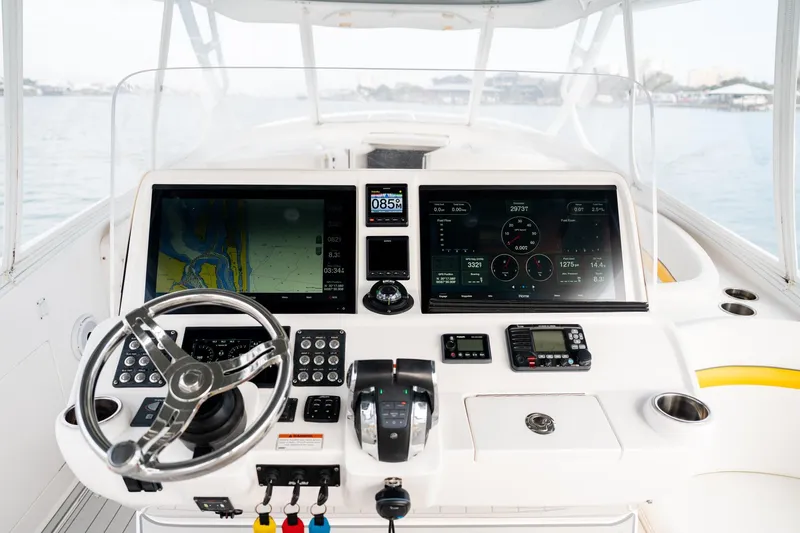 Slide: The Image of 2020 Intrepid 407 Cuddy helm with advanced navigation and control systems. - 73