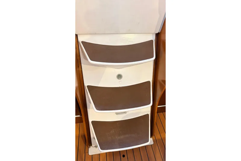 Slide: The Image of Interior steps of 2004 Beneteau First 36.7 yacht with wooden flooring. - 13