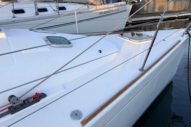 Slide: The Image of 2004 Beneteau First 36.7 sailboat deck with rigging and hatch details. - 18