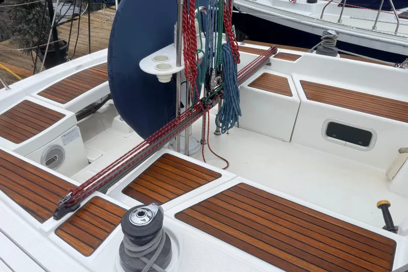 Slide: The Image of Cockpit of 2004 Beneteau First 36.7 sailboat with teak decking and rigging. - 22