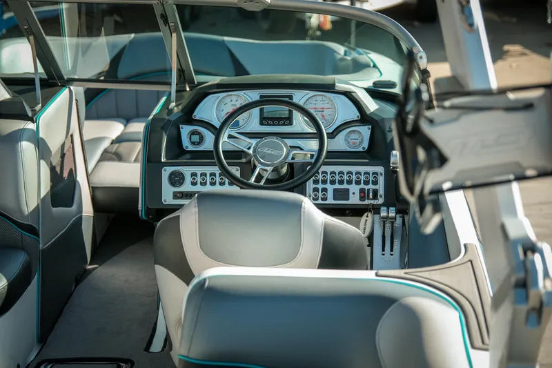 Slide: The Image of 2019 MB B52 23 Classic boat interior with modern dashboard and steering wheel. - 10
