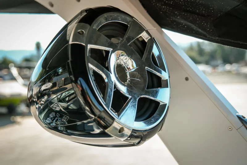 Slide: The Image of Close-up of a 2019 MB B52 23 Classic boat speaker with chrome finish. - 17