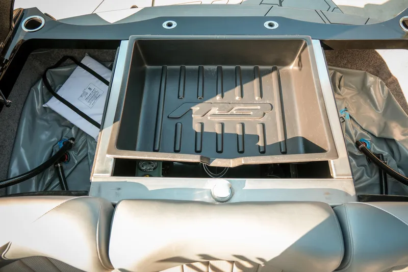 Slide: The Image of 2019 MB B52 23 Classic boat interior with storage compartment and seating. - 18