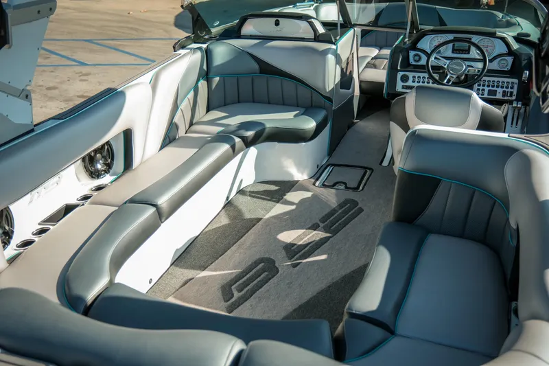 Slide: The Image of Luxurious interior of 2019 MB B52 23 Classic boat with plush seating and modern dashboard. - 9