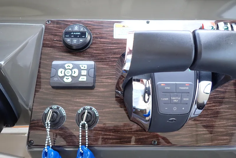 Slide: The Image of Control panel of 2019 Carver C37 Coupe with steering and electronic controls. - 45