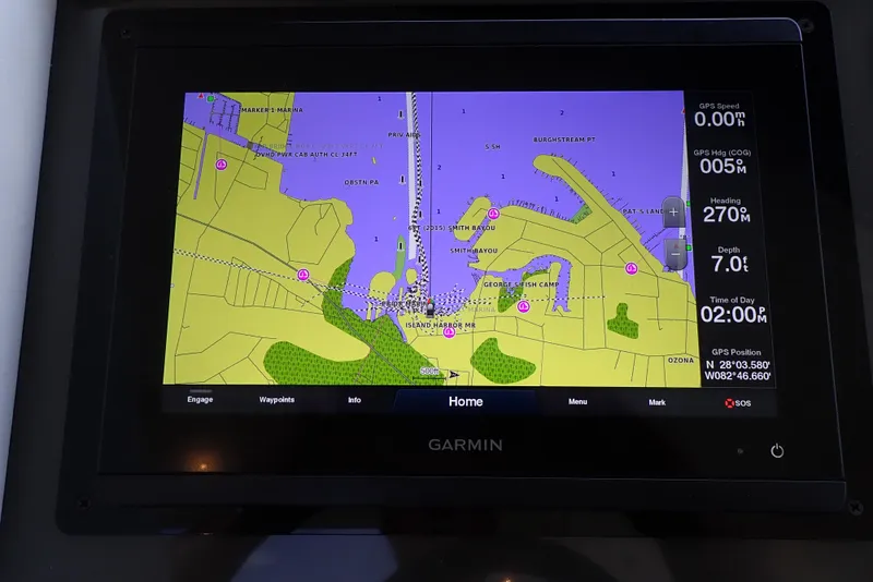 Slide: The Image of Garmin navigation system on 2019 Carver C37 Coupe, displaying nautical chart and GPS data. - 47