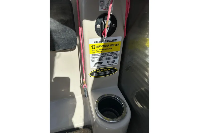 Slide: The Image of 2019 Harris Cruiser 230 capacity label, 12 persons or 1637 lbs, with cup holder. - 10